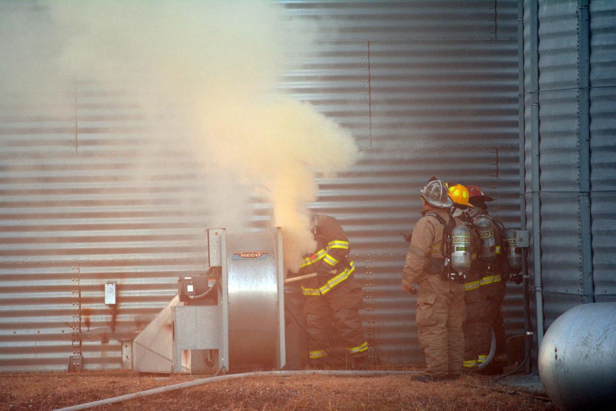 Firefighters battle grain bin fire Local News