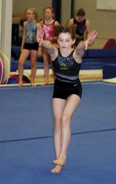 Young gymnasts prepare for meet