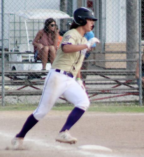 Gage Scholting rounds first base in seventh inning