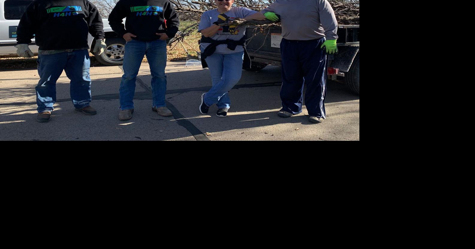 Habitat for Humanity helps clean yard for Fremont veteran