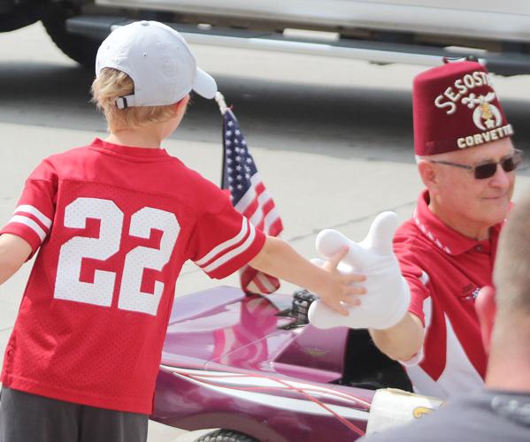 Giving a high five to a young child