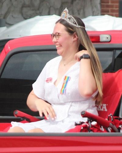 Courtney Bockman smiles in parade