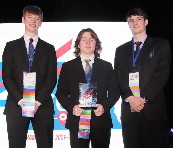 Henry Coleman Rylan Kastens Reid Fletcher at conference