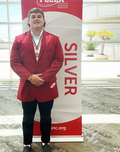 Ben Yoder with silver medal at nationals