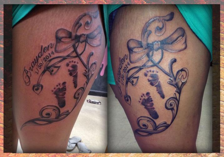 footprints tattoo.jpg