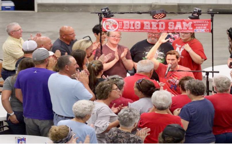People clapping at Big Red Sam Show