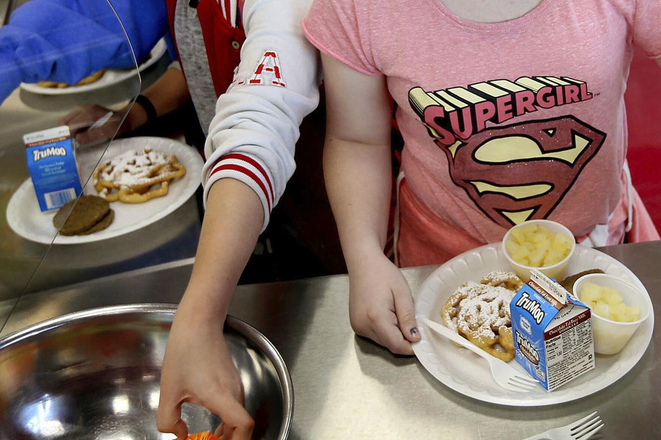 School lunch fees banned for families