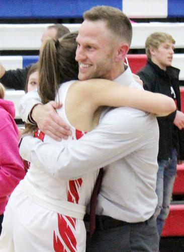 Joel Haveman hugs Reagan Aronson