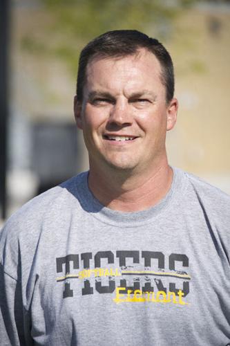 Tigers give coach 100th win, remain alive in district play