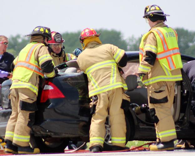 Firefighters helping to extricate person