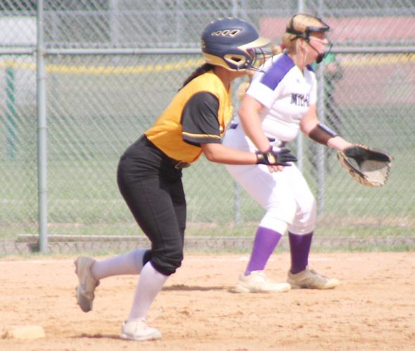 Sophia Lange leads off second base