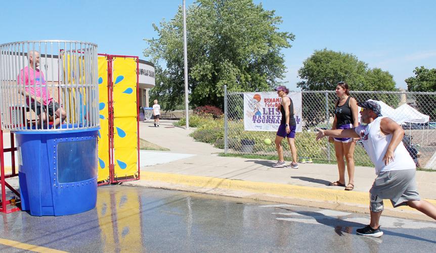 Teachers brave the dunk tank on Disability Awareness Day to raise money for  senior heading for the Special Olympics World Games – AAPS District News