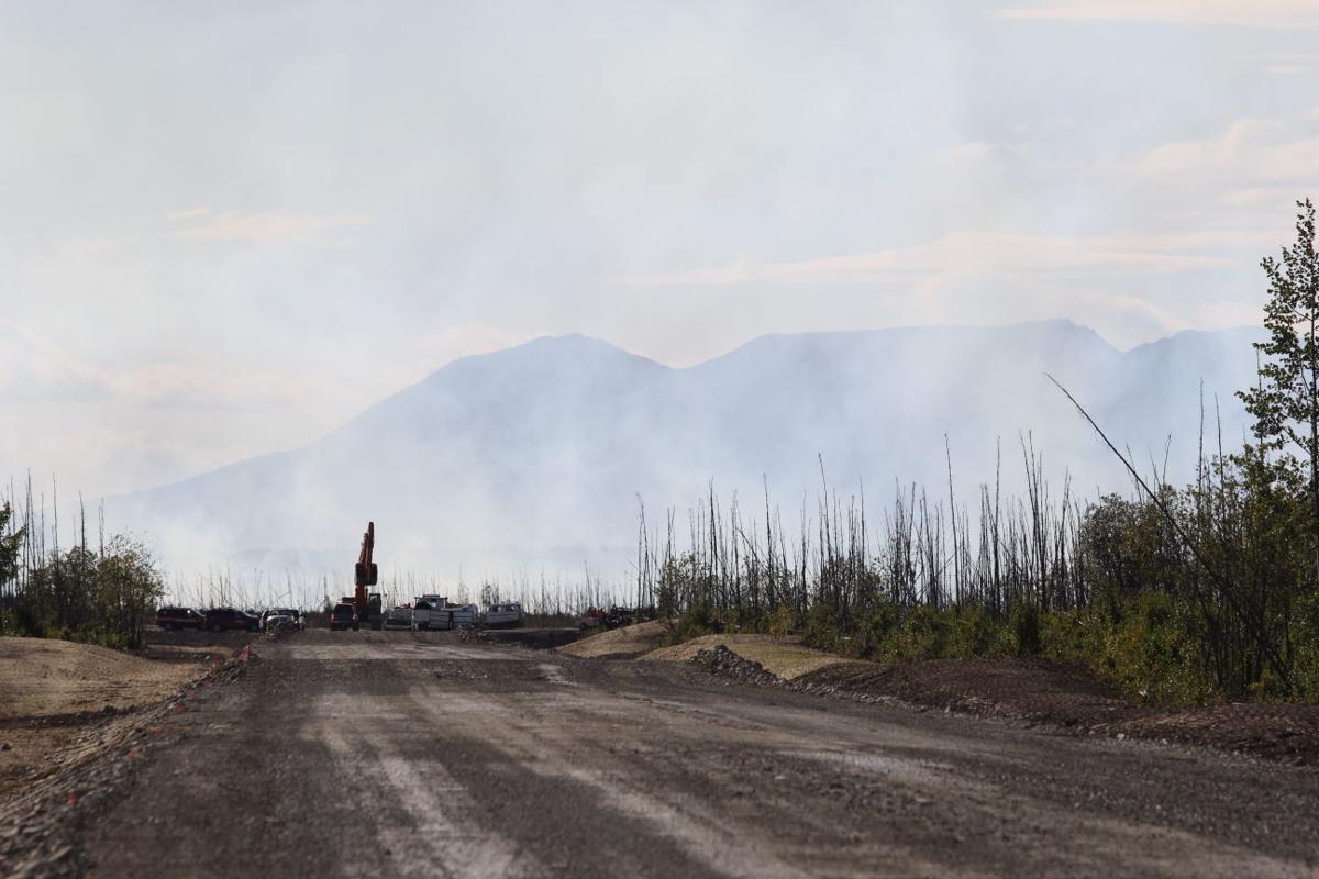 Fire crews, terrain slow progress of Houstonarea wildfire Breaking