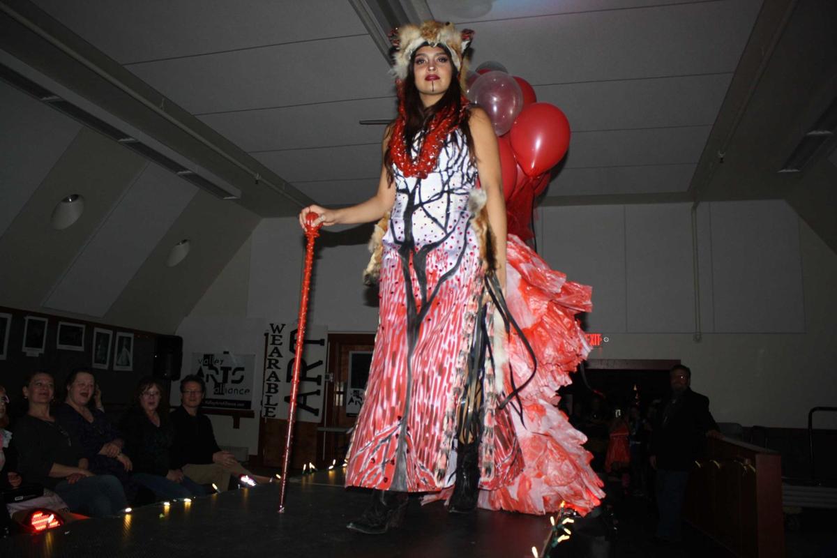 Wearable Art Models Don Costumes Made Of Recycled Materials