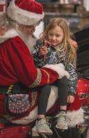 Forget the Sleigh: Santa rolls into Denali Harley-Davidson for annual toy drive