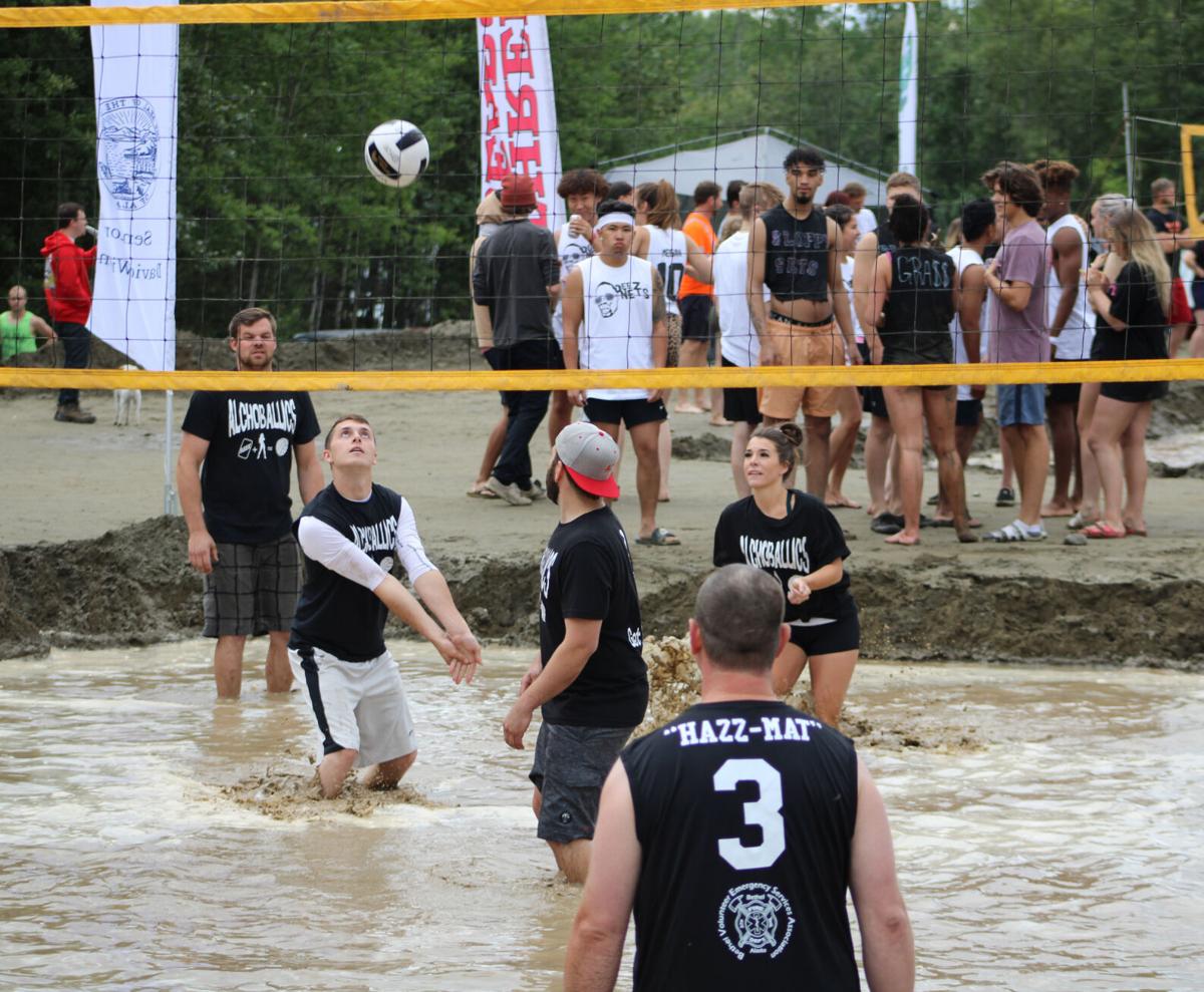Fun in the mud; Big Lake Lions Club continues tradition with volleyball