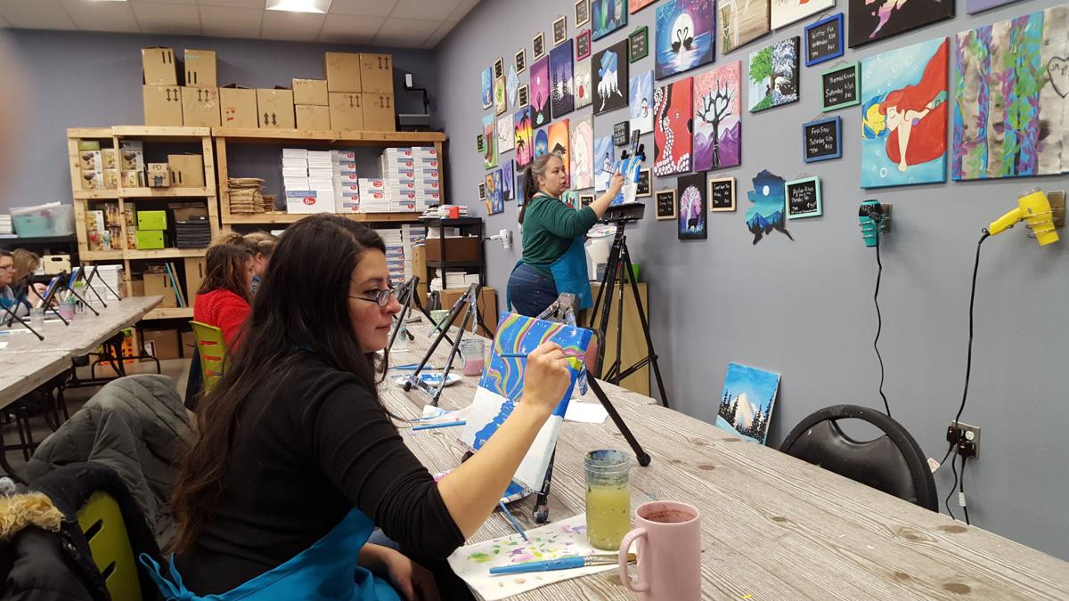 Dozens of locals paint together at Paint Nights with Sara’s new location Arts & Entertainment