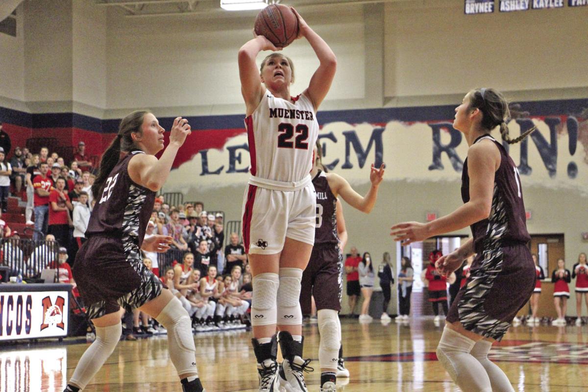 Photo gallery: Muenster Lady Hornets cut down the nets ...