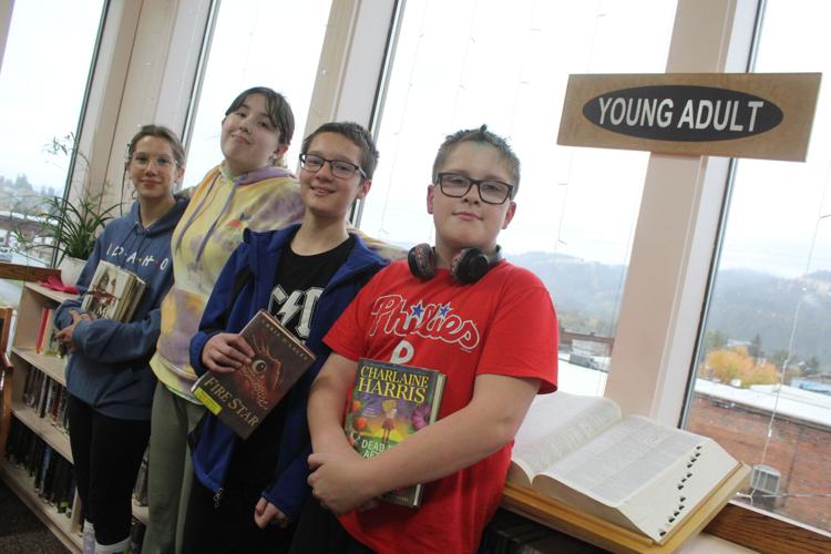 Local teens are challenged to read eight books in seven months as part of the Idaho Teen Reading Challenge. Pictured left to right: Ava Preston, Peyton Hutchison and Laine Stoltzfus.