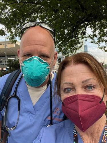Local nurse Margie Cooke takes a selfie with one of the volunteers from across the country who travelled with her to help Ukrainian refugees in Warsaw Poland.