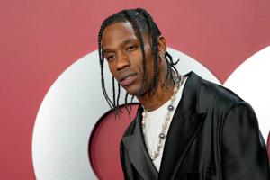 Rapper Travis Scott arrested after Miami Beach police say hip-hop star drunkenly yelled at yachters