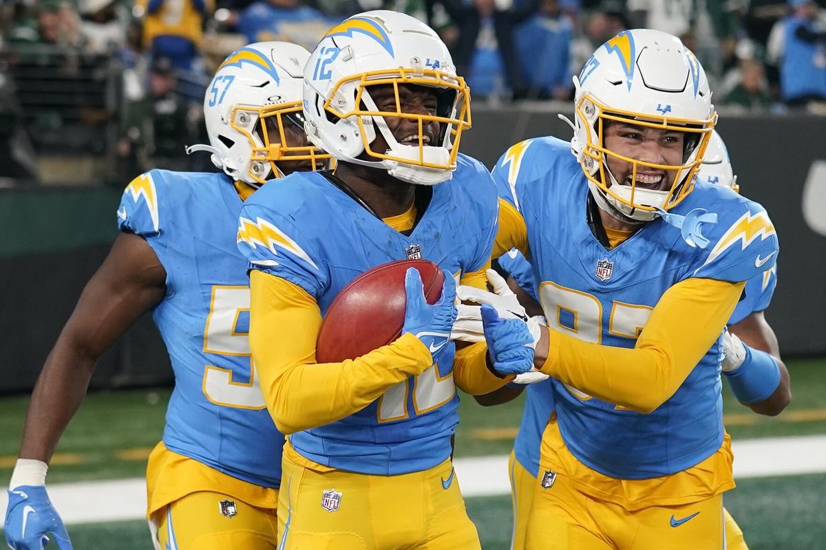 Chargers roll past Jets behind sackhappy defense