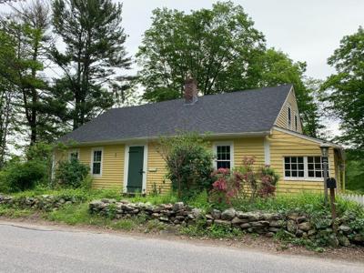 NerdWallet mortgage writer Kate Wood bought this 1740s Cape Cod-style house in late 2020. (Photo courtesy of Kate Wood)