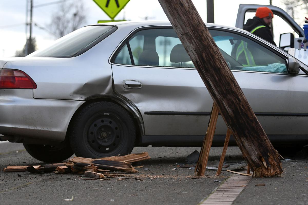 Car hits telephone pole after crash on Ninth Street Local