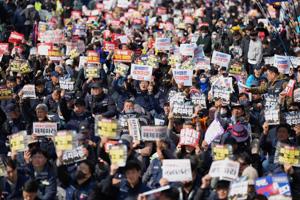 South Korea's President Yoon Suk Yeol removed from office over declaration of martial law