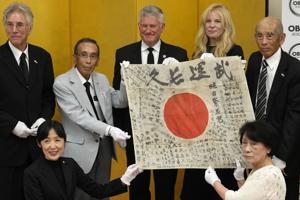 'It's a miracle,' says family of Japanese soldier killed in WWII, as flag he carried returns from US