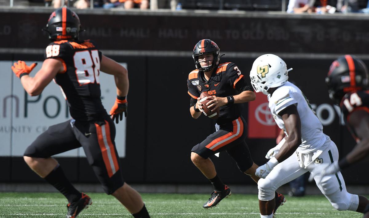 Osu Football No Clear Cut Leader In Osu Quarterback Competition Football Gazettetimes Com