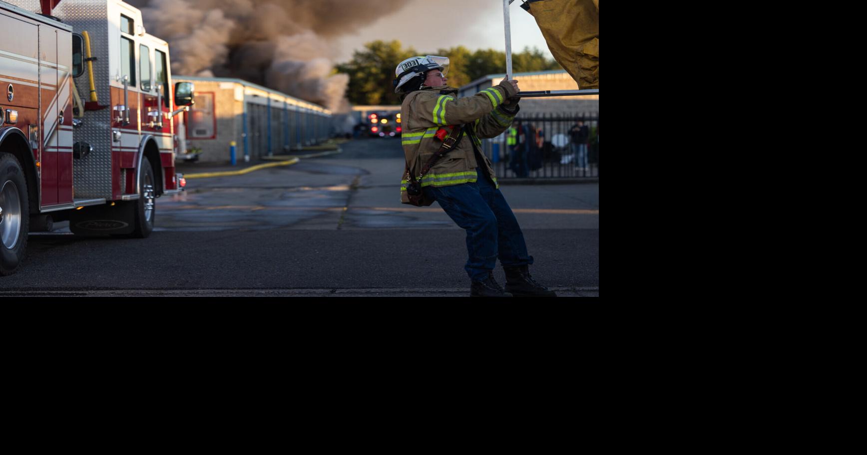 two-alarm blaze draws six departments in storage unit fire