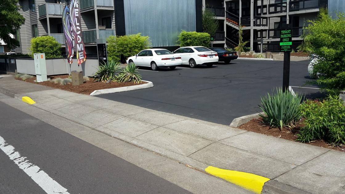 Curbs can be painted to protect driveways Local