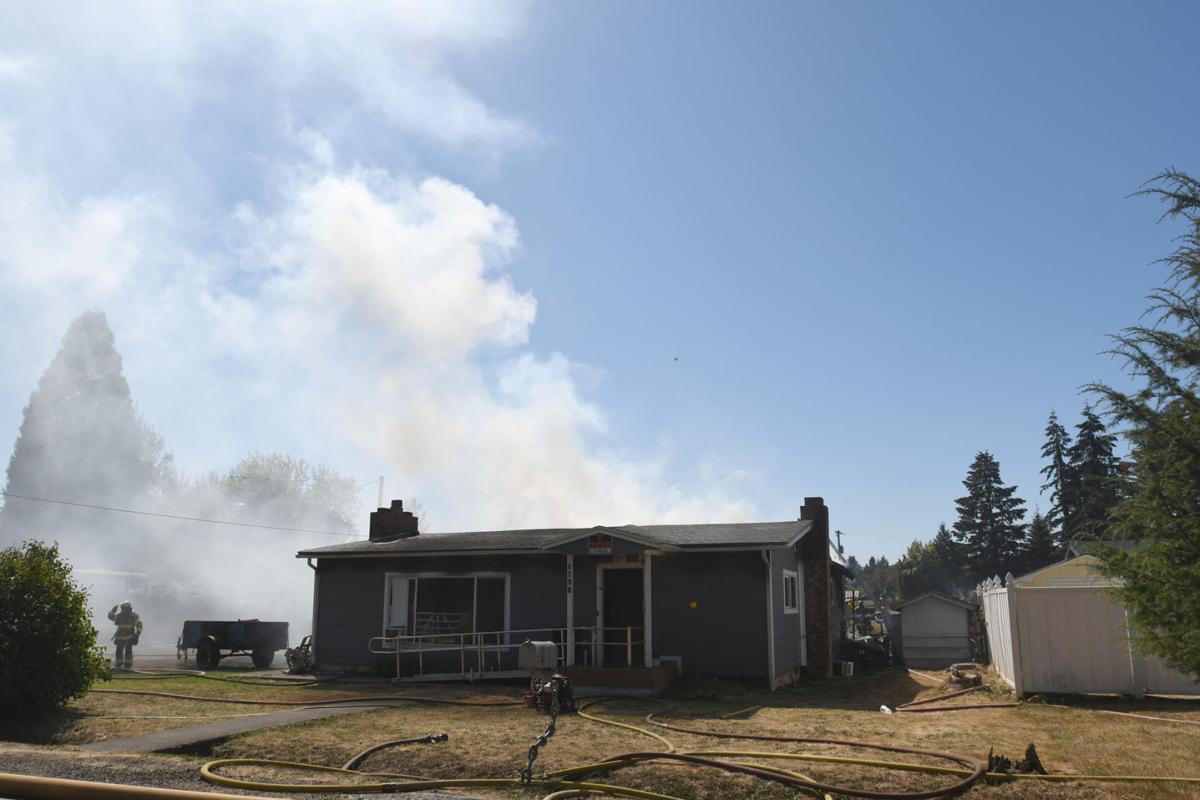 Gallery Firefighters Extinguish a Family's House in Sweet Home