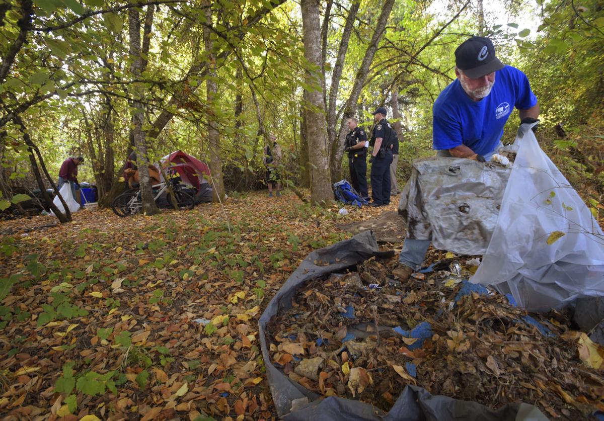Crews haul out 14,000 pounds of trash after homeless camp cleanup