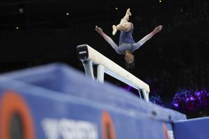 Biles leads U.S. women to record 7th straight world gymnastics team title