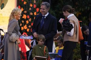 Biden, first lady hand out books and candy while hosting thousands for Halloween trick-or-treating