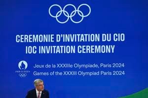 IOC president invokes Lennon's memory as Paris marks 1-year countdown to war-clouded Games