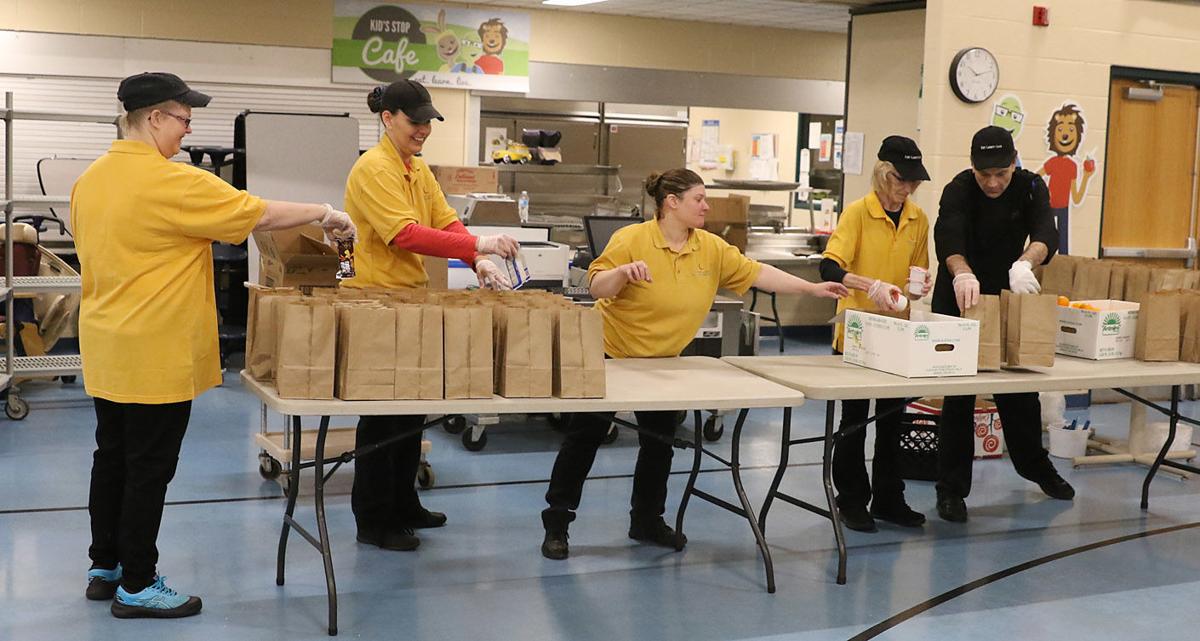 Upper Adams packs food for students