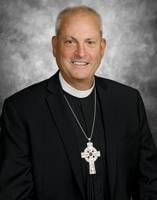 Herr being installed as bishop