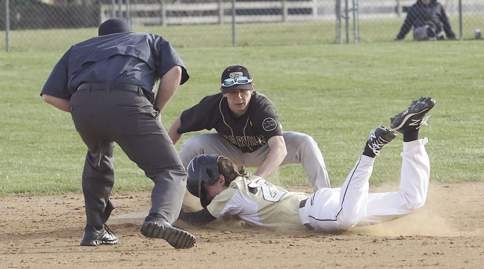 Collins clutch hit lifts Squires past Canners Sports