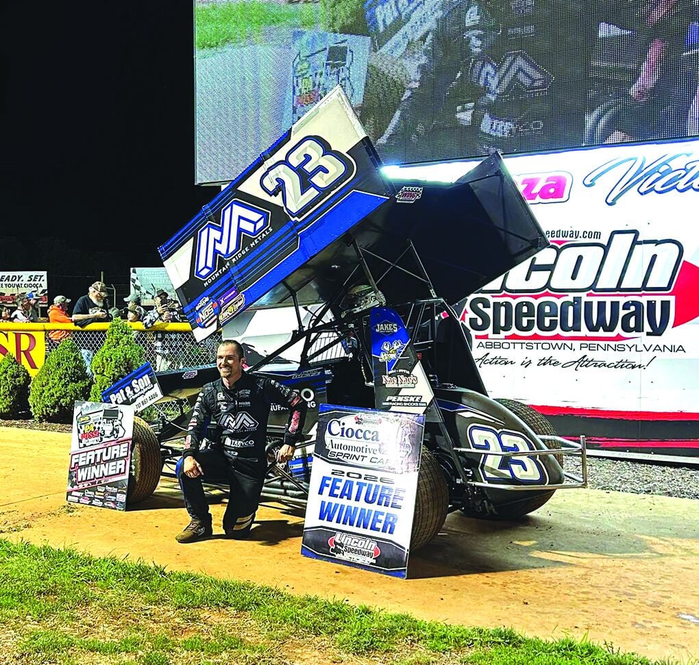 Chase Dietz celebrating in victory lane at Lincoln Speedway