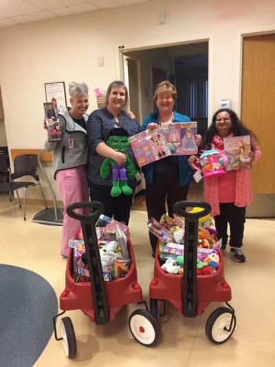 Banner Employees Calm Children S Fears With Toys News