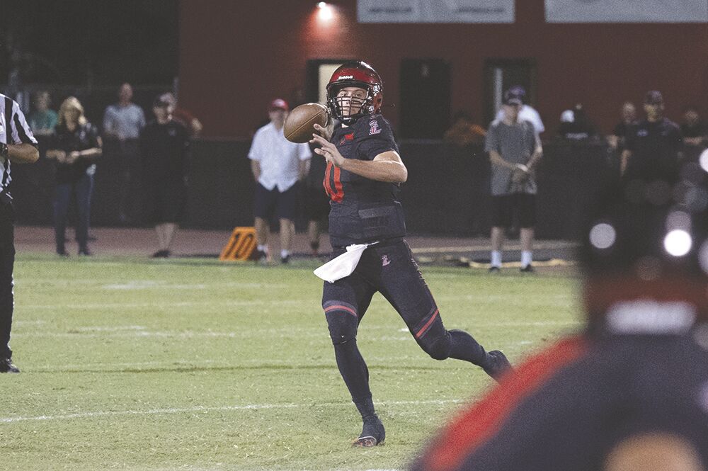 Hayden Fletcher Breaks Records as Liberty’s Star Quarterback BVM Sports