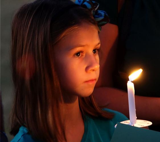 Friends and family hold candlelight vigil for missing Glendale teacher