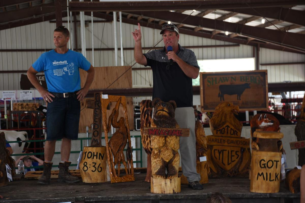 woodcarving auction at the mitchell county fair with