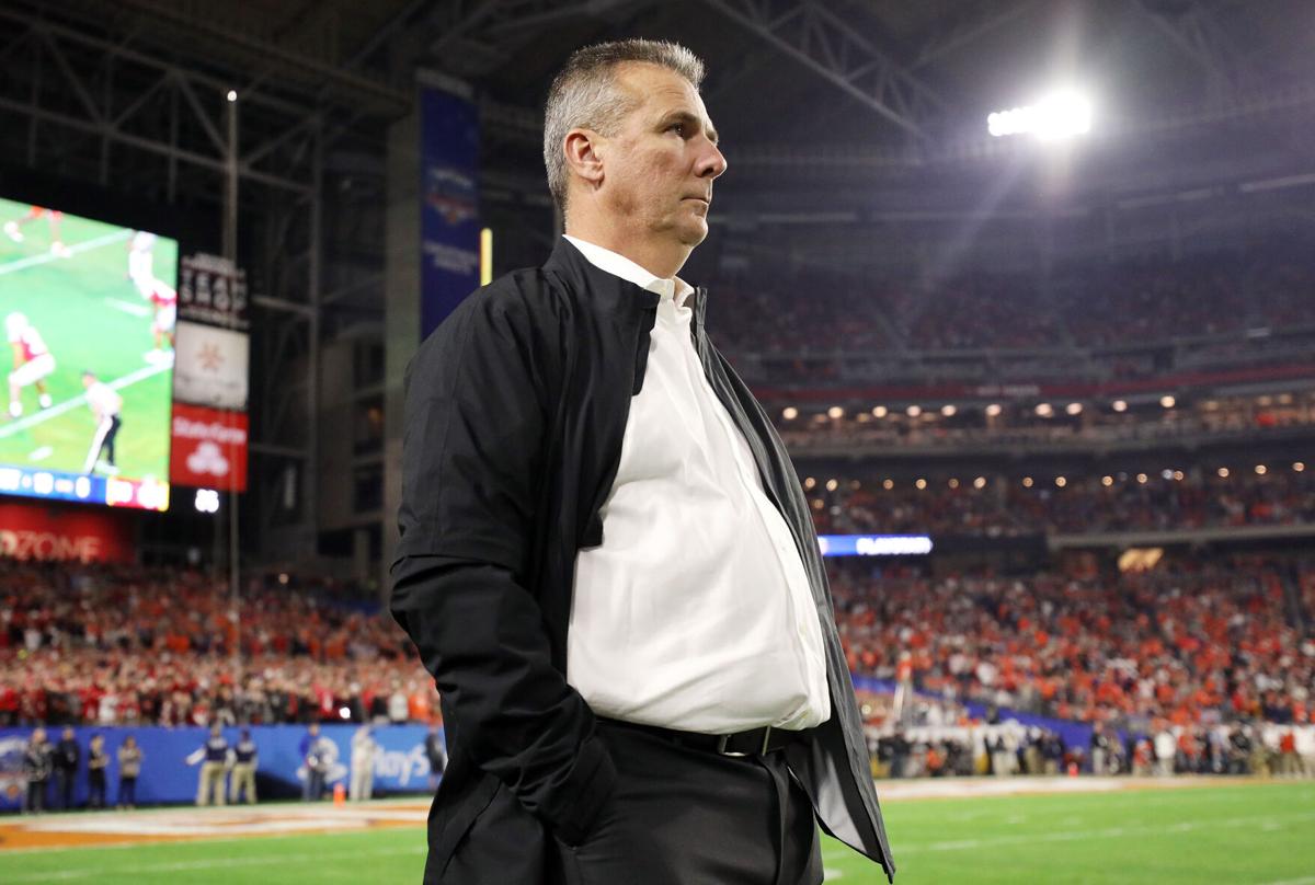 GLENDALE, ARIZONA- DECEMBER 28: Former Ohio State Buckeyes head coach Urban Meyer looks on during the College Football Playoff Semifinal between the Ohio State Buckeyes and the Clemson Tigers at the PlayStation Fiesta Bowl at State Farm Stadium on Dec. 28, 2019 in Glendale, Arizona.