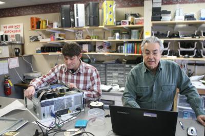 Father son team up in computer repair firm Mason City North Iowa 