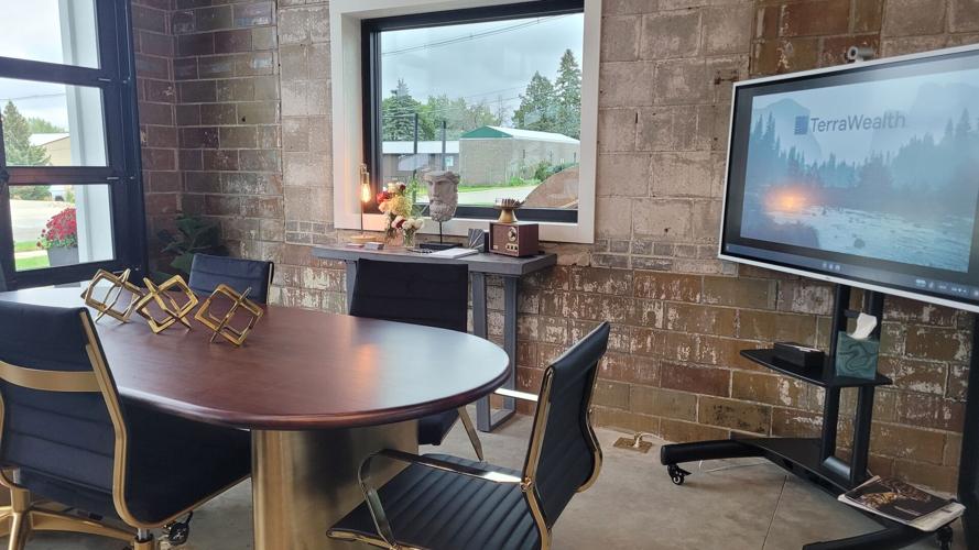 Classic art and modern technology are featured in this meeting space at the TerraWealth building in Forest City..jpg