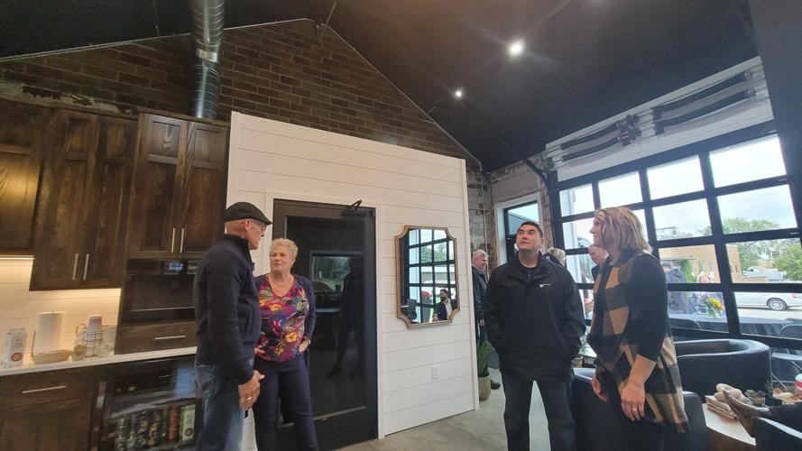 Rep. Henry Stone of Forest City checks the ceiling of the renovated TerraWealth building in Forest City..jpg